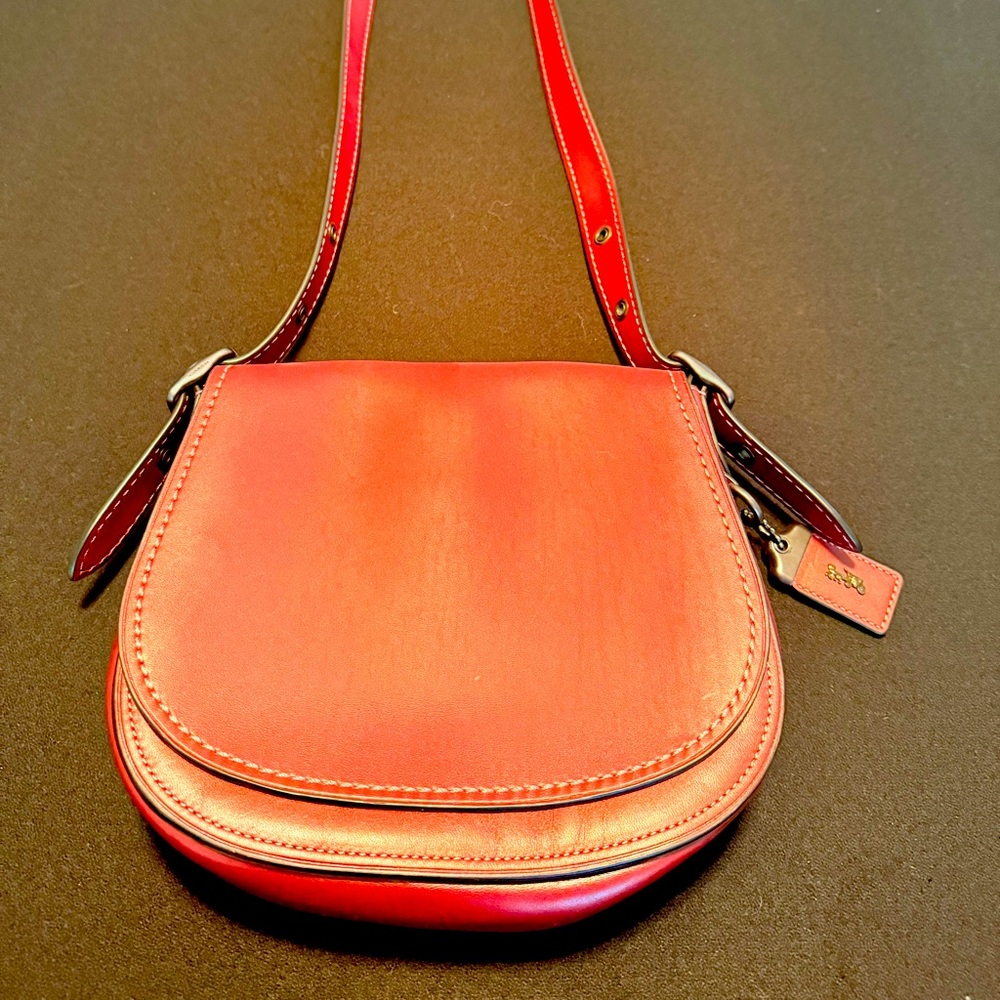 Small Coach handbag. New without tags.